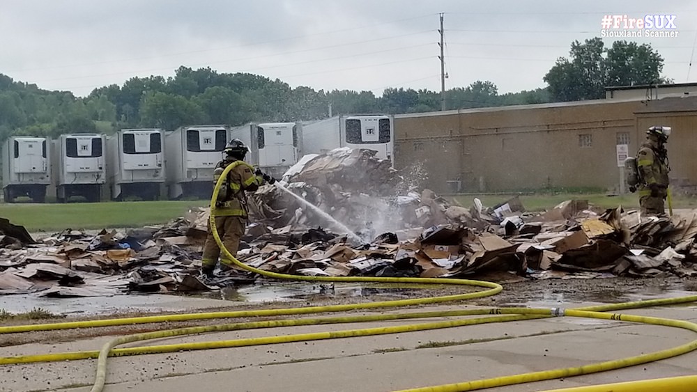 Garbage truck fire just before noon Monday on Highway 75