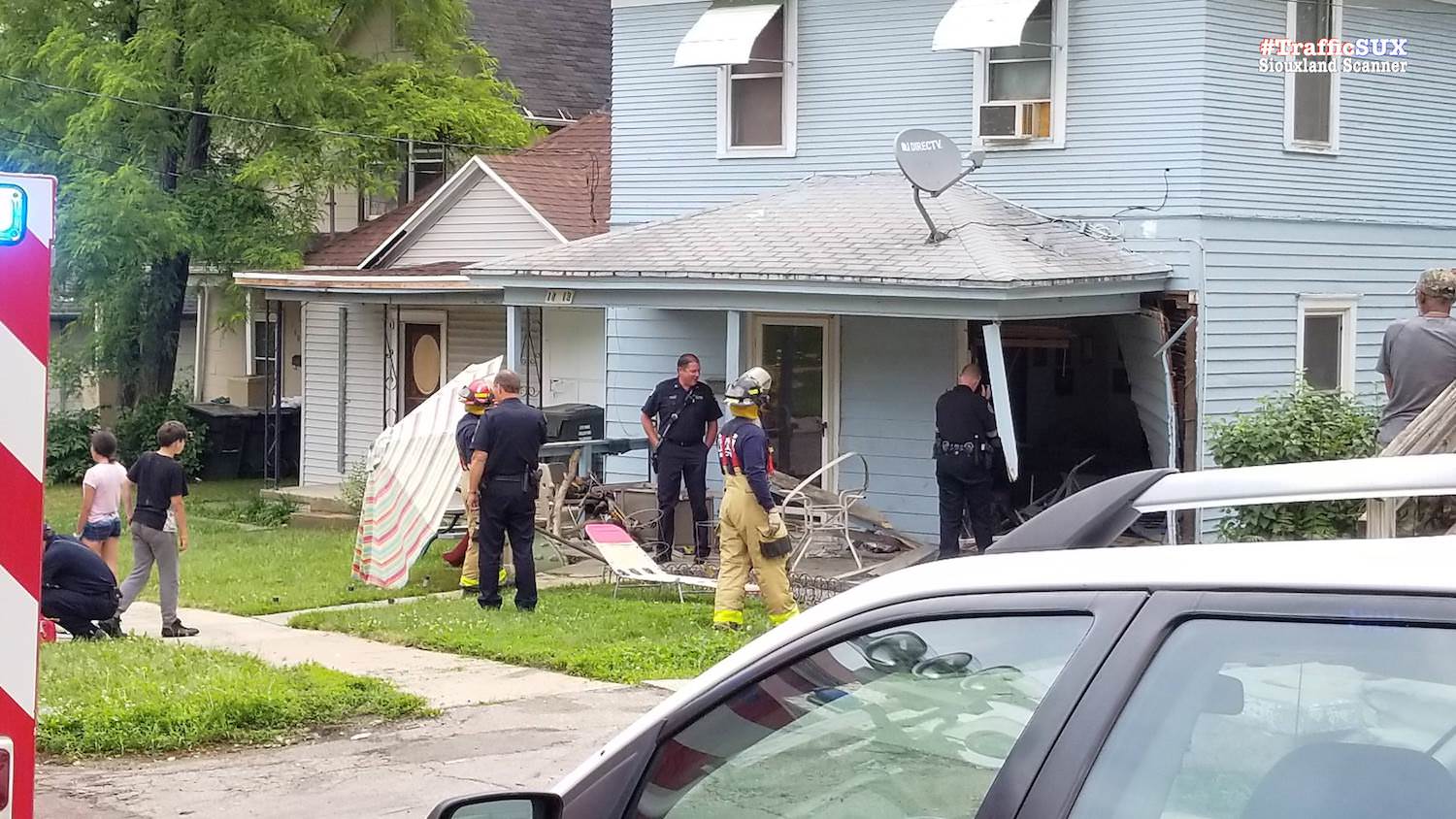 No injuries when an SUV crashed into home and the driver fled the scene before being arrested